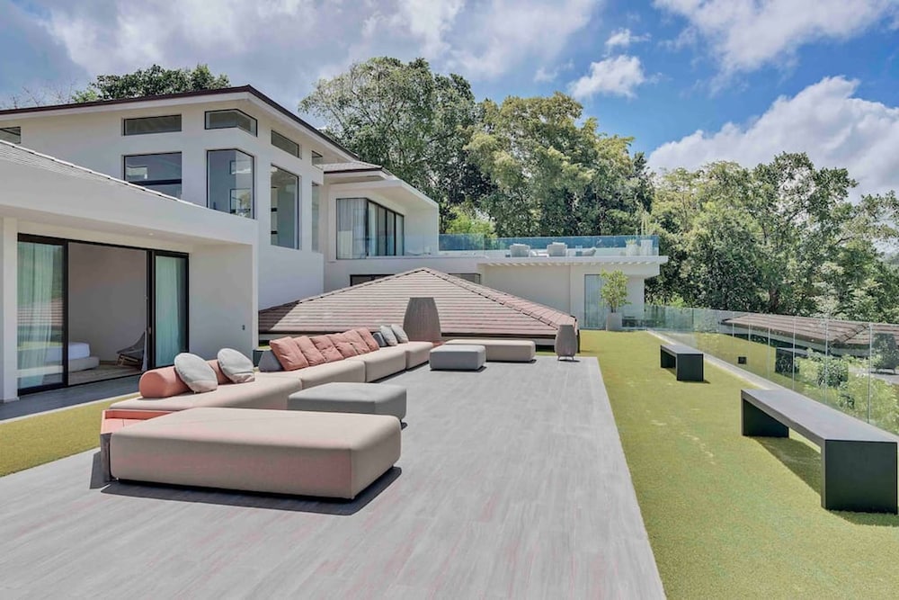 Gorgeous Beach House Perched Right Over the Ocean