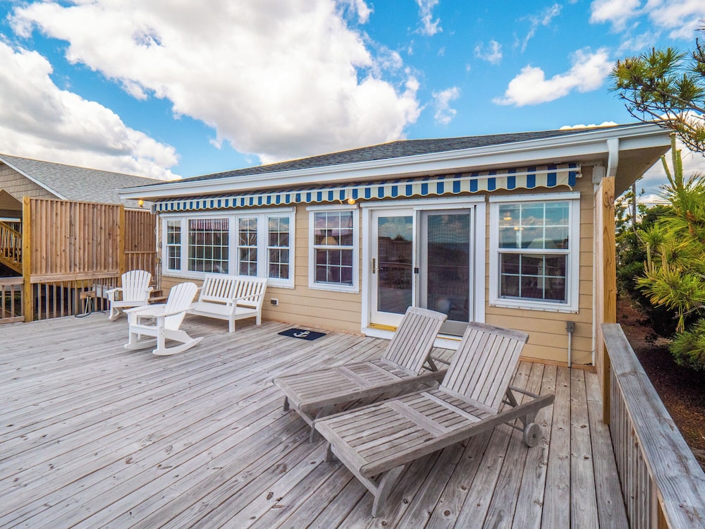 A Charm of Finches by Topsail Realty