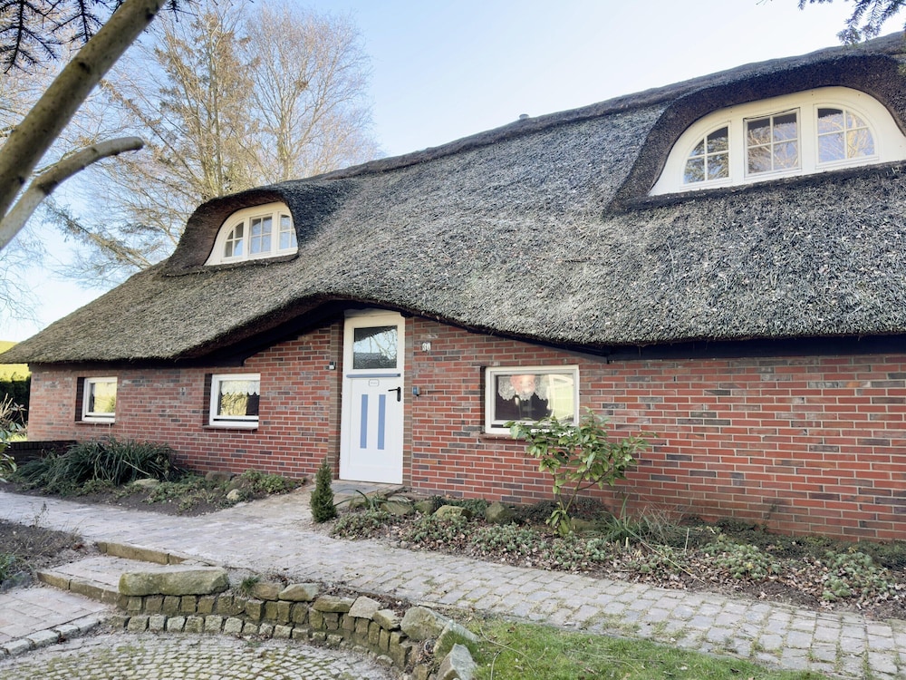 Ferienwohnung im Reetdachhaus, Burhave