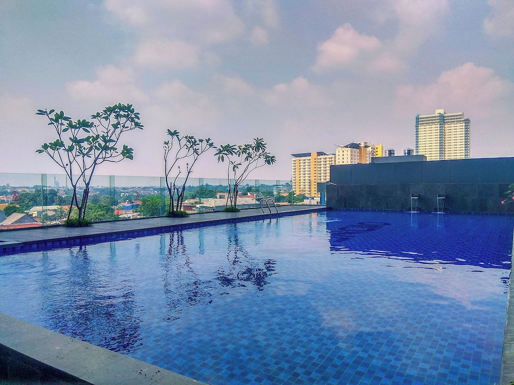 Cozy Studio At 32Th Floor Evenciio Margonda Apartment