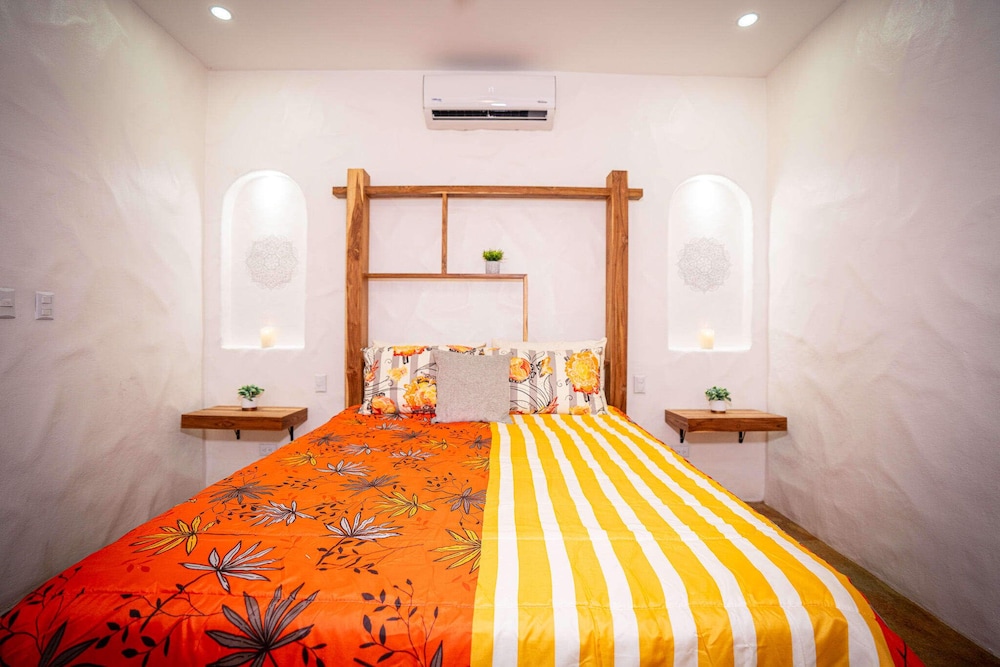 Bohemian Tropical Villa with a Tiki-Style Swimming Pool & Swim-Up Bar with an Attached Studio Apartment