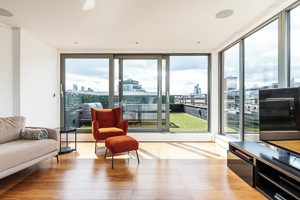 Modern Haven With Terrace View & Urban Charm