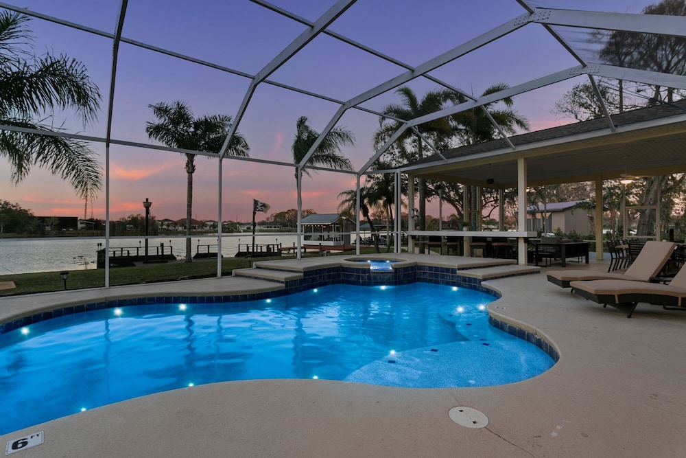 Luxe Waterfront Hideaway w Pool & Pirate Ship Dock