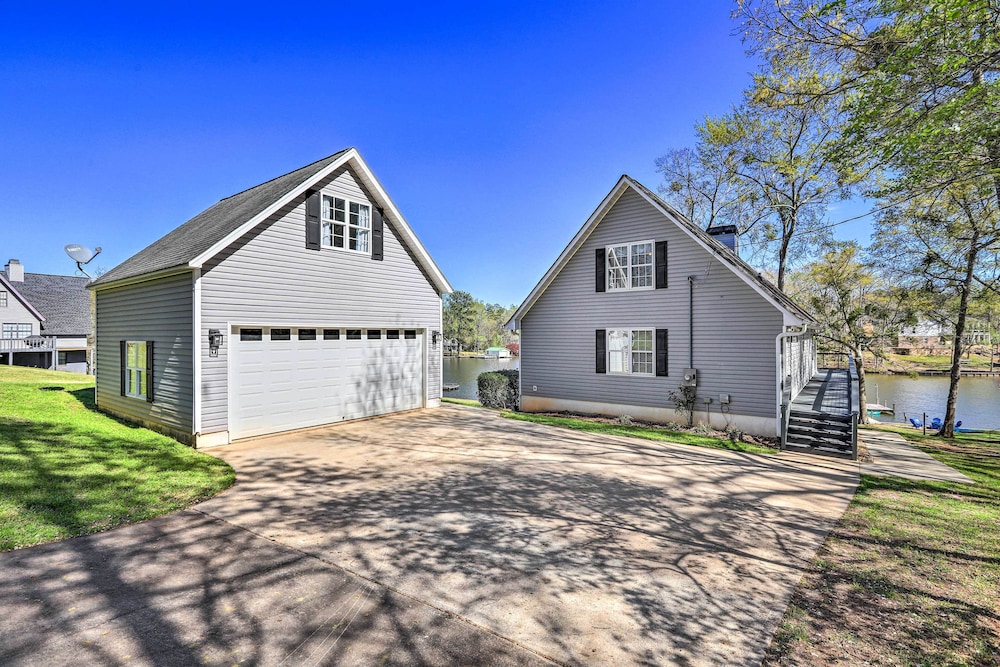 Lakefront Eatonton Home: Boat Dock + Fire Pit view 4