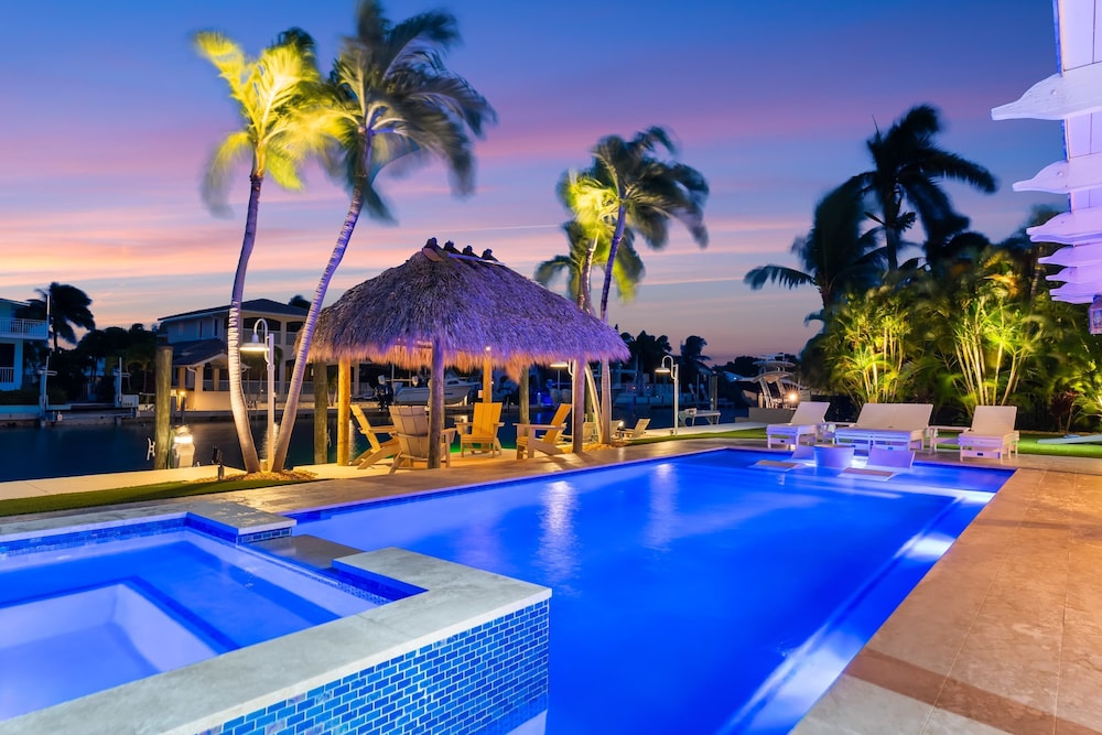 Deep Blue Waterfront Gem Pool Kayaks Dock