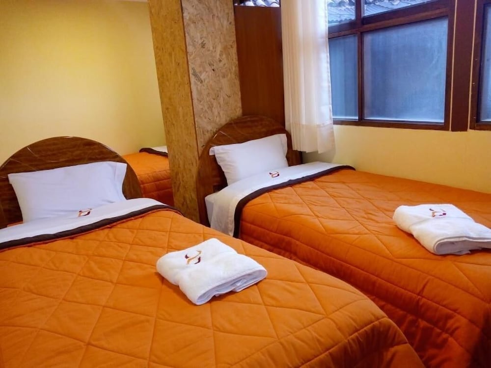 Posada Saqra en Cusco — hotel room