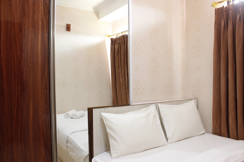 Cozy 2BR Tamansari Panoramic Apartment view 3
