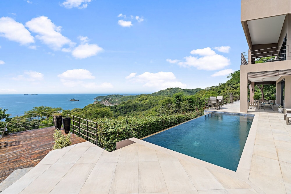 Luxury 5BR Oceanview Villa with Infinity Pool, King Beds, and Sunset Views Over Playa Prieta