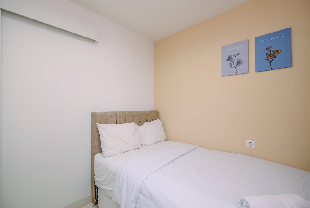 Comfort and Homey 2BR at Sentul Tower Apartment