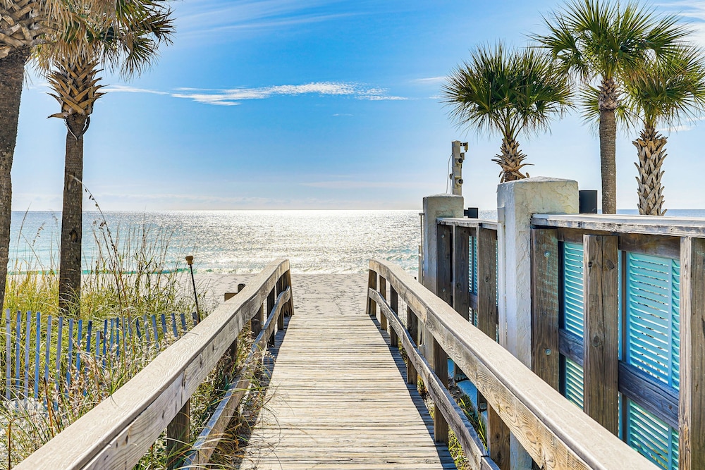 Walk to Beach: PCB Gem w/ Community Pool Access!