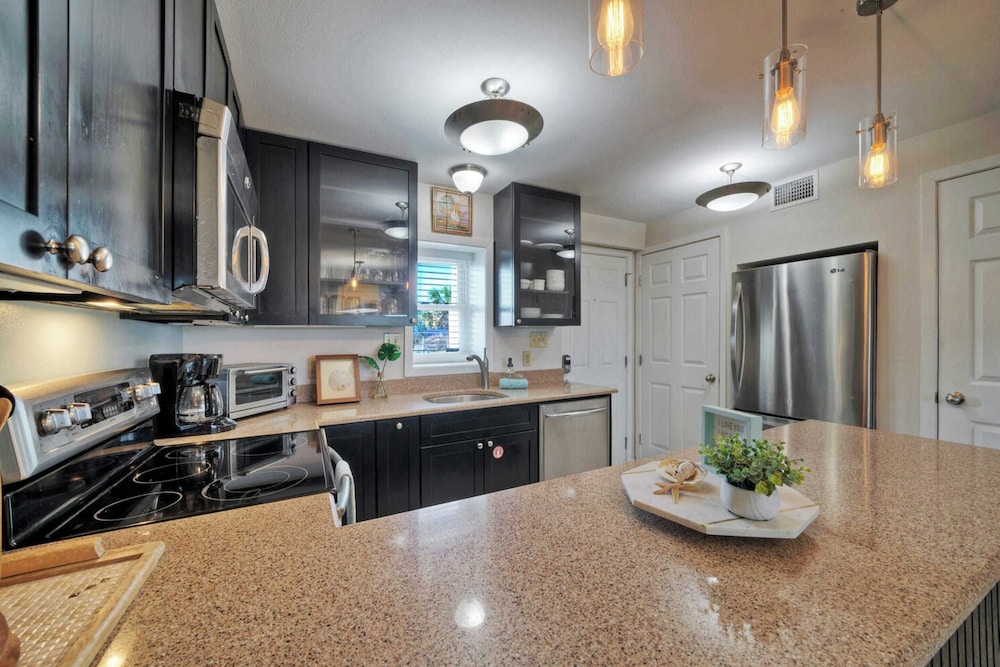 15 Condos, Sleeps 96 w/ Pools & Beach Access Island Retreat by Avantstay