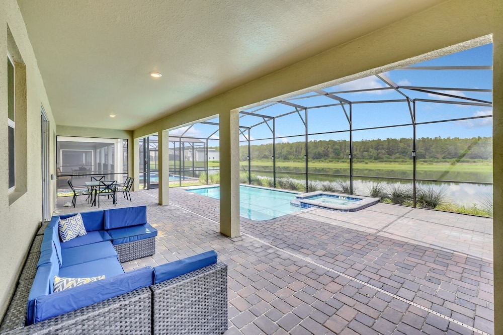 Serenity Lakeview Retreat Stunning Water Views, No Rear Neighbors, Private Pool, Game Room & Star Wars Cinema