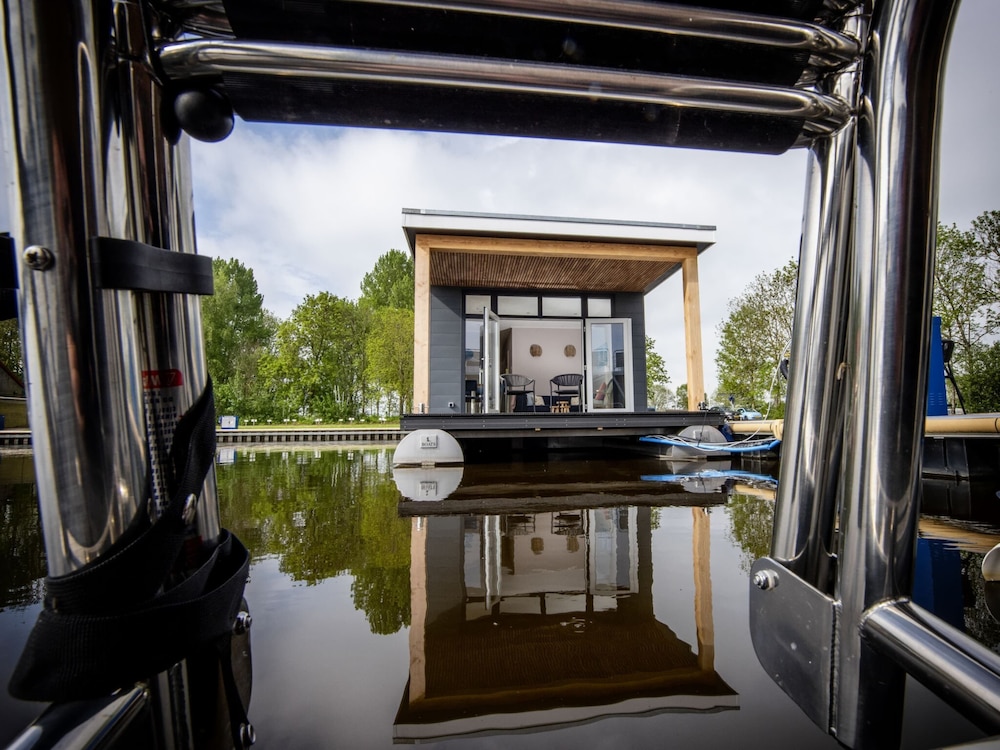 Modern Houseboat With View of the Lake