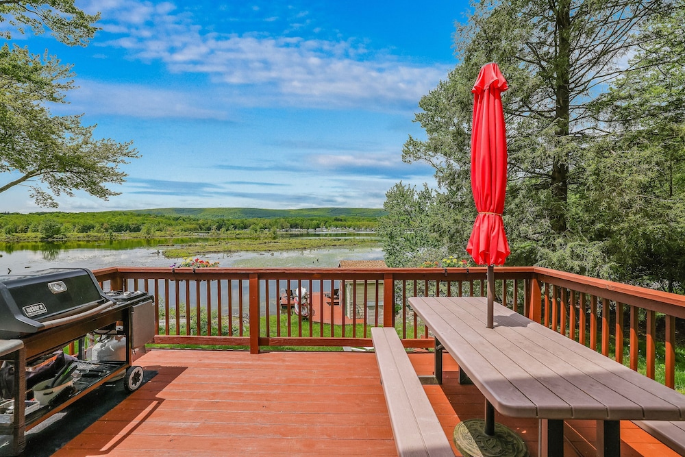 Lakefront A-frame Dock Kayaks Fire Place