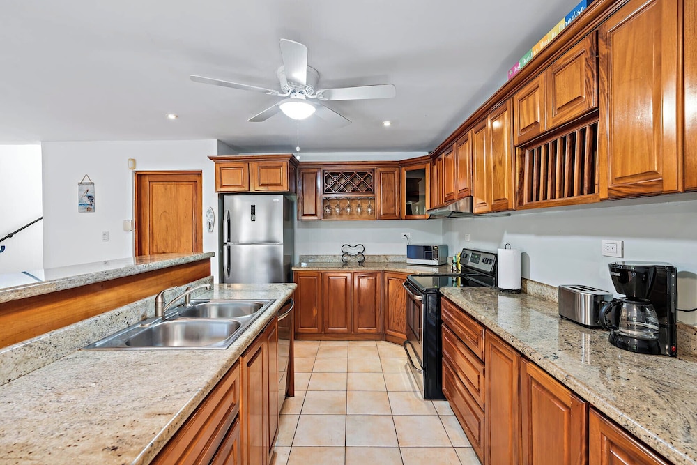 Inviting Home with Colorful Decor and Private Backyard Oasis with a Swimming Pool & Shaded Terrace