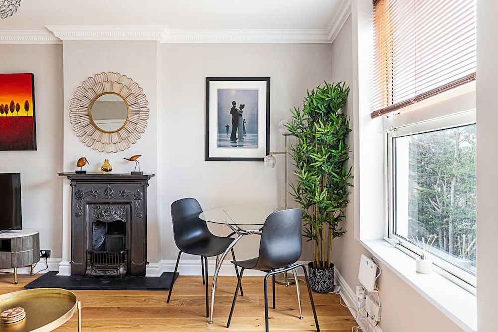Modern Top-floor Victorian Charm in Kensington