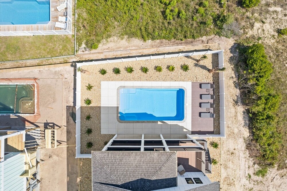 1040 Break / 1040 Ocean Blvd West 4 Bedroom Home by RedAwning