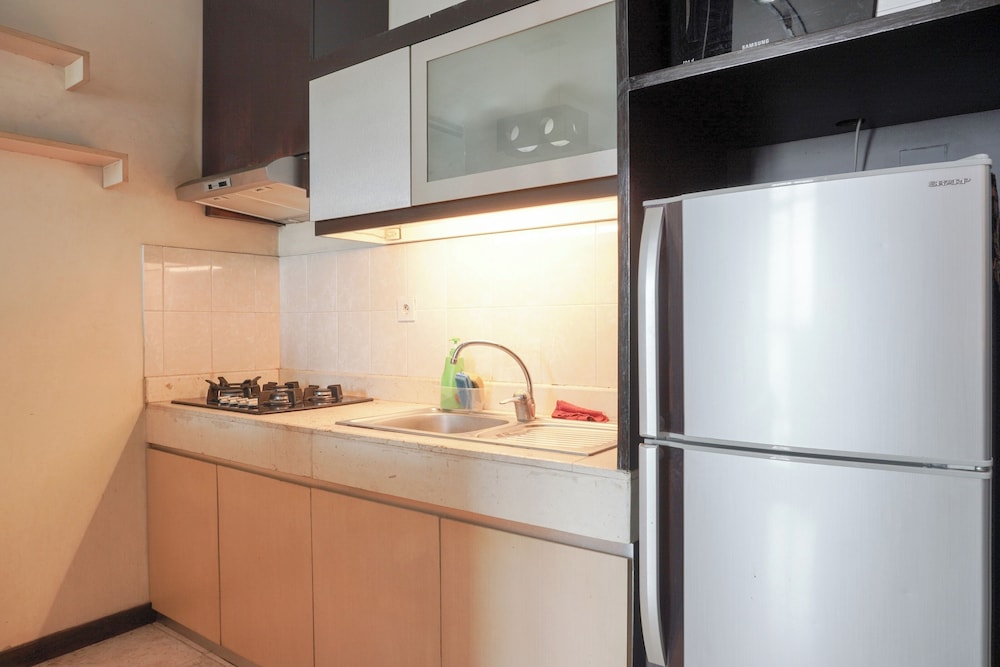 Elegant and Comfy 1BR with Extra Room Apartment at Bellagio Residence