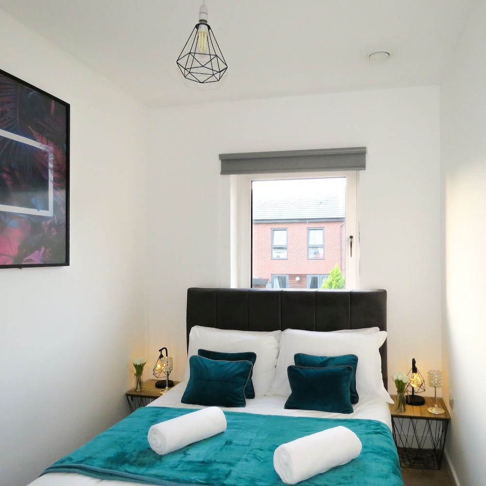 Tudors eSuites Private Garden & Garage view 2