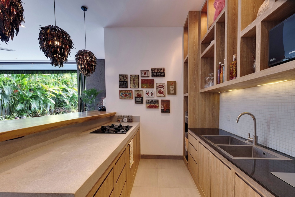Luxury 4BR Haven, Steps to Canggu's Beach Elegance