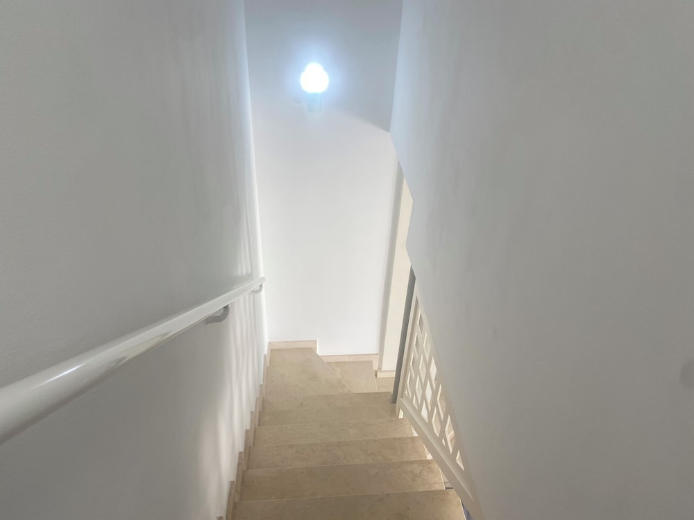 New Renovated Family Home Above Swimming Pool!