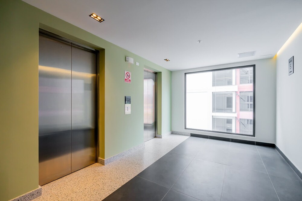 w Elegant 2BR Apartment in the Heart of Centriqo