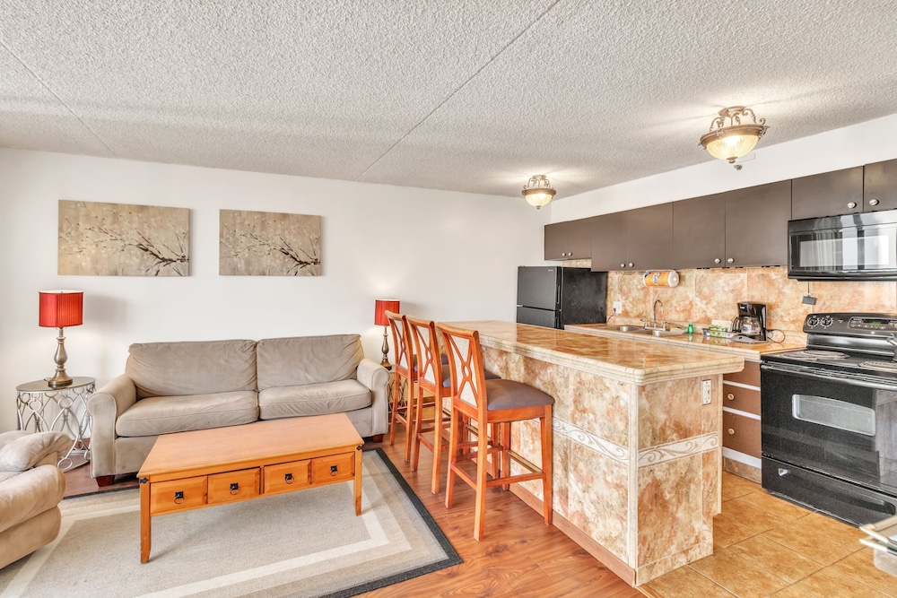 Waikiki Banyan Condo Located One Block From Waikiki Beach! by Koko Resort Vacation Rentals