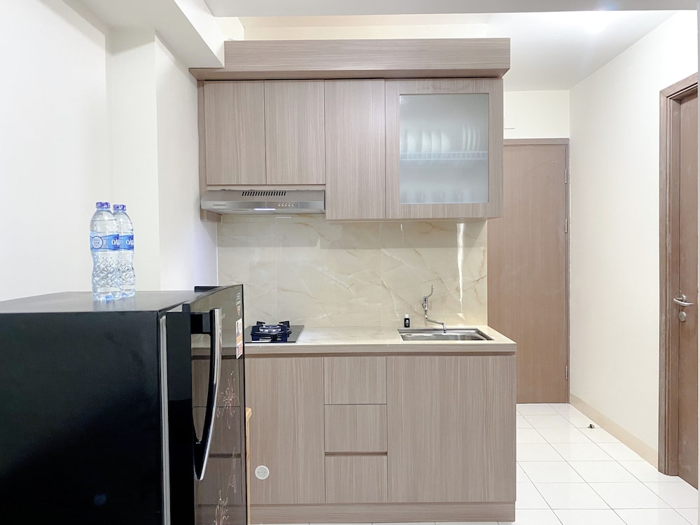 Warm and Homey 2BR at Podomoro Golf View Apartment