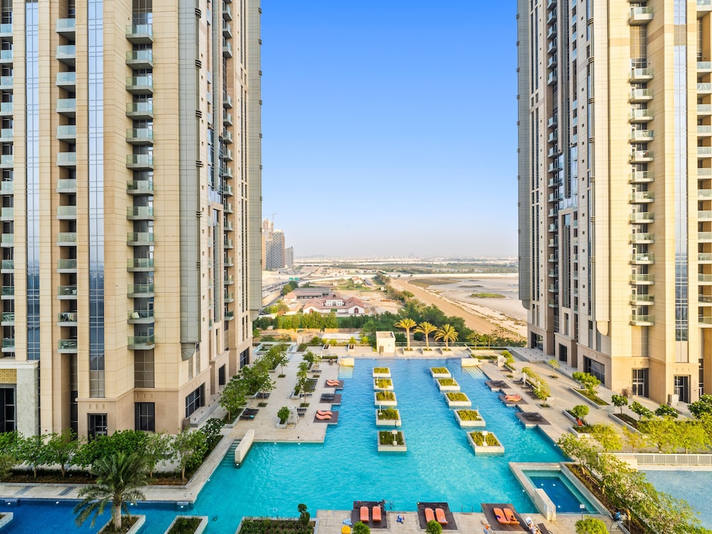 Modern Apartment With Partial Canal and Pool View