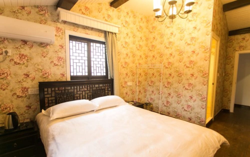 Zunyuelou Inn Tongli