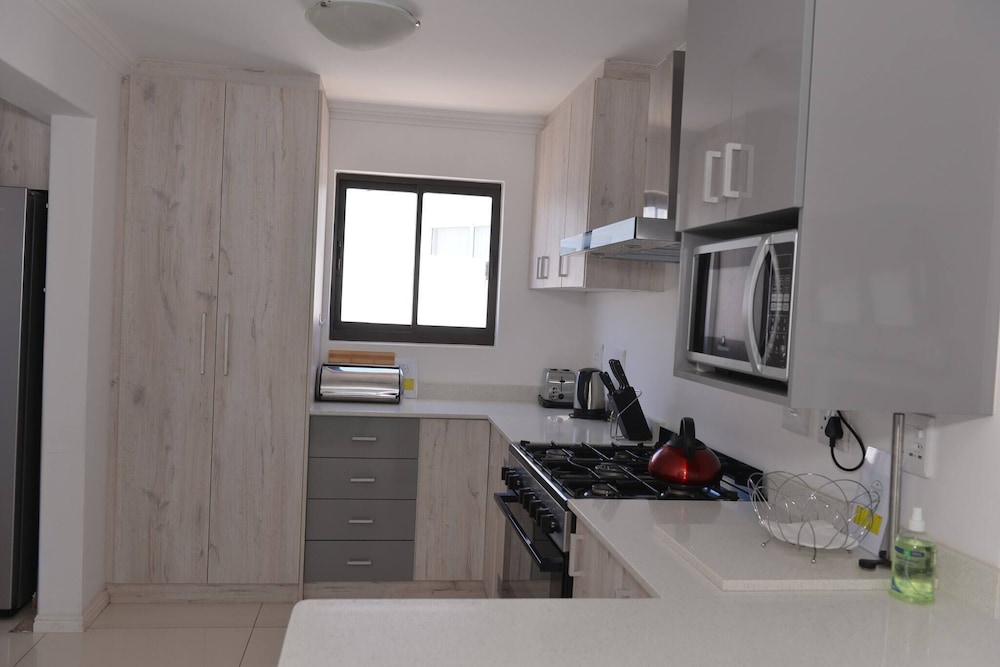 Pelican Cove is a Modern 4-bedroom Holiday Home in Langebaan With Some Sea Views