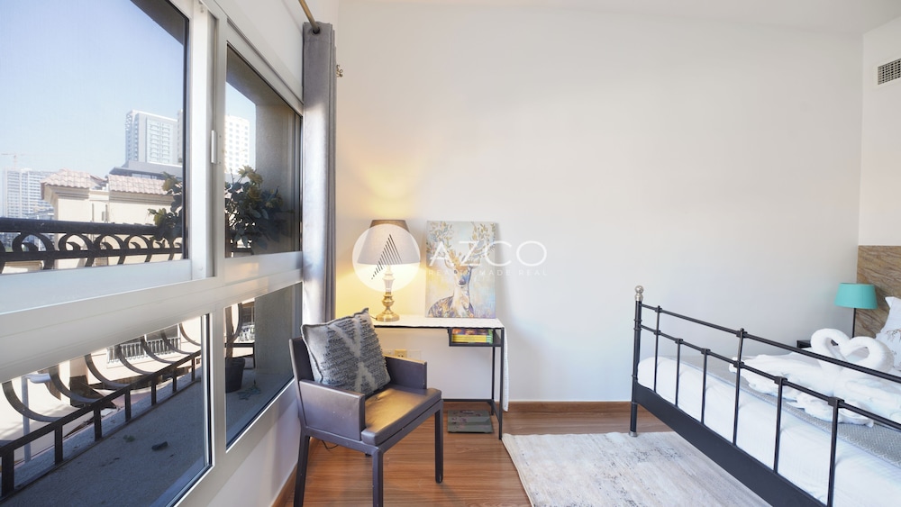 Cozy 1 BHK with City View in JVC by AZCO