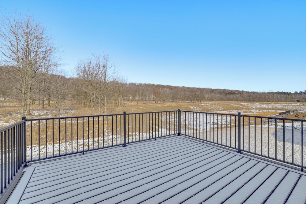 Deck w/ Forest Views: Modern Home in Rochester!