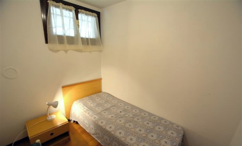 Large row House With Private Fenced Garden for 10 Guests in Lignano Pineta