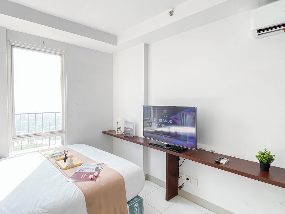 Basic Studio Room At Azalea Suites Apartment