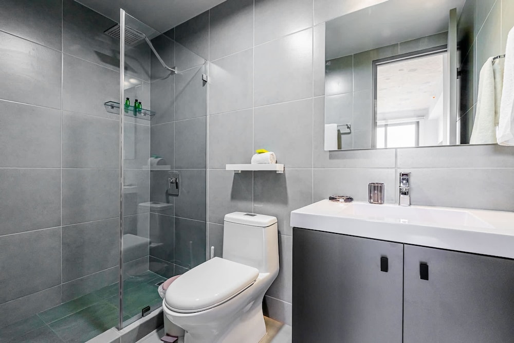 w Elegant 2BR Apartment in the Heart of Centriqo