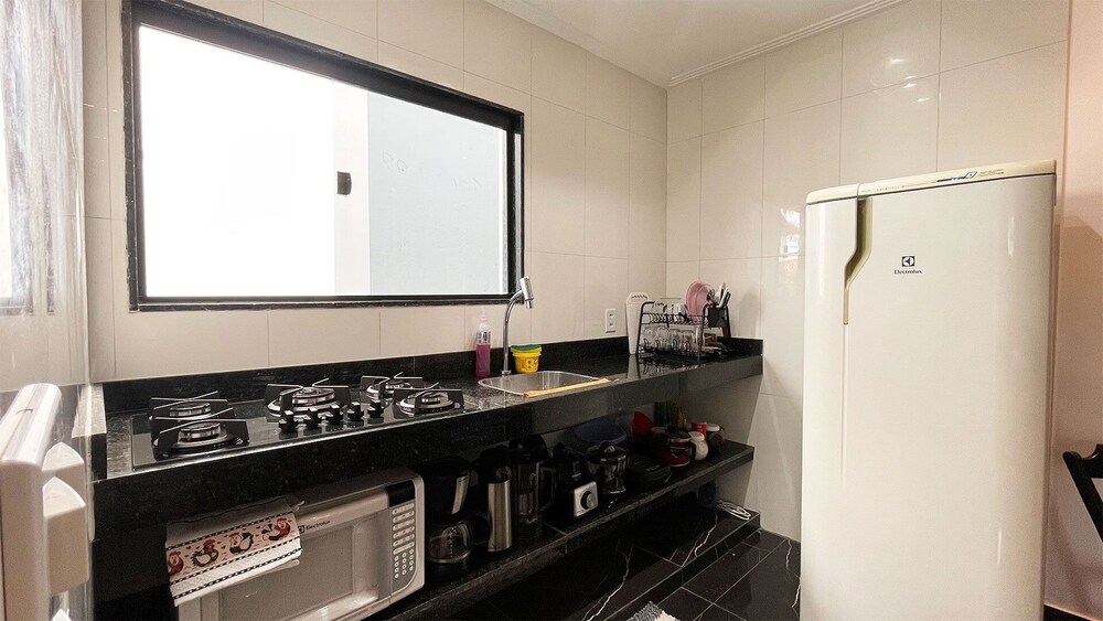 The Férias Loft confortável c cozinha
