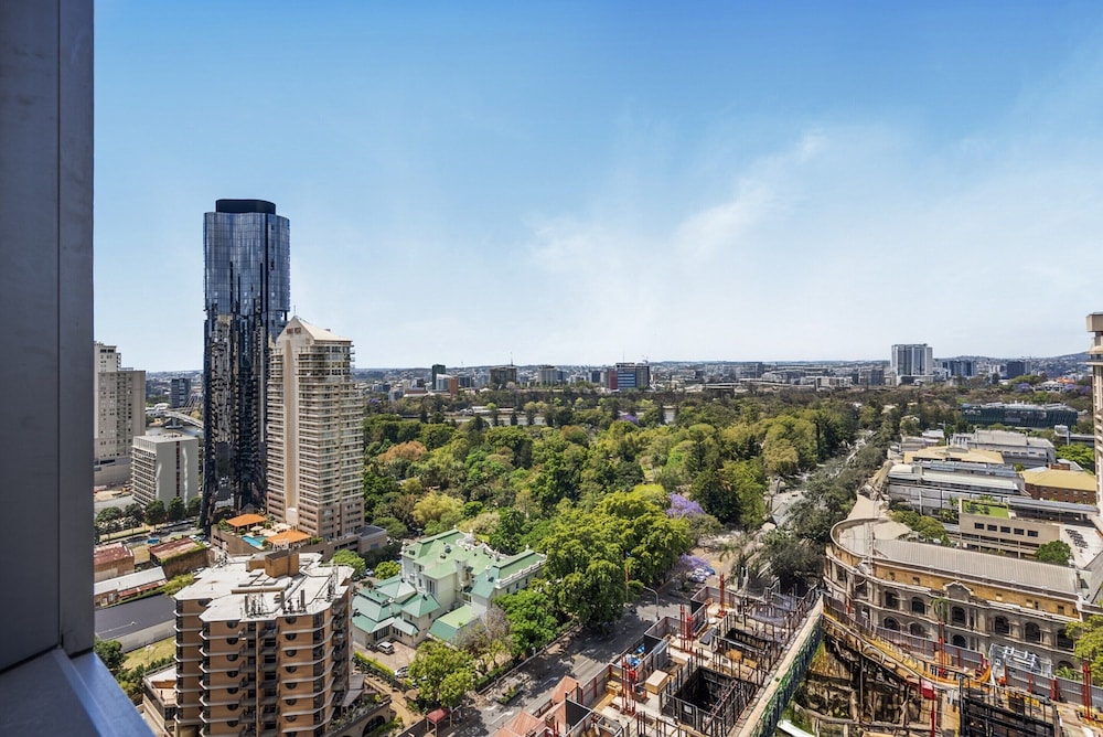 Modern City Escape With Pool Access and Views