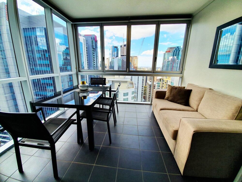 2BR Epic Views CBD 2 Cars Pool Wine Gym Netflix view 3