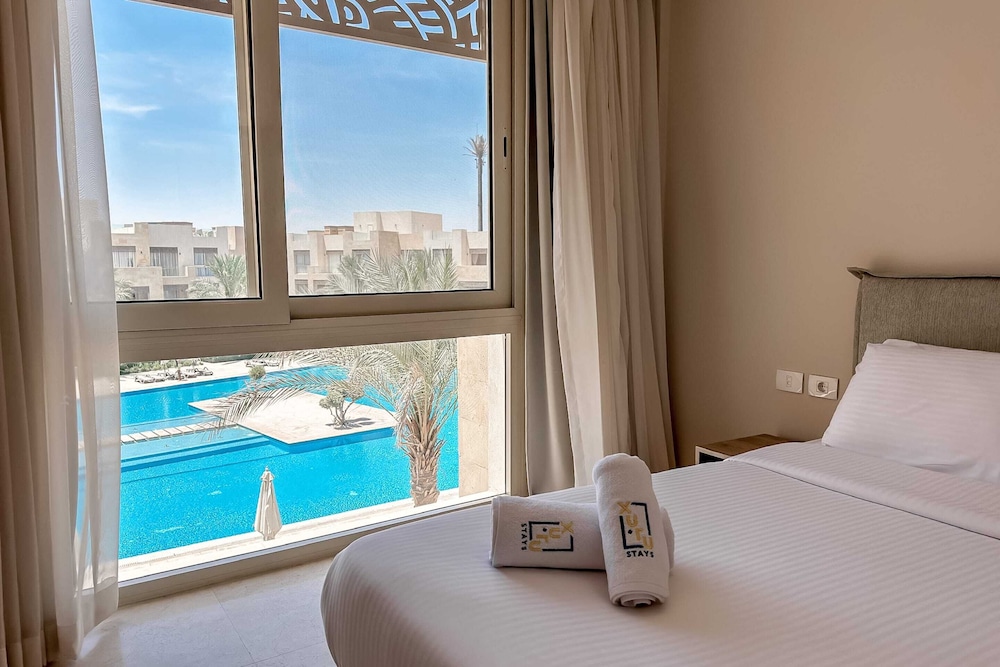 Xuru Stays I Exotic 1bdr w/ Outdoor Terrace Pool & Beach Access