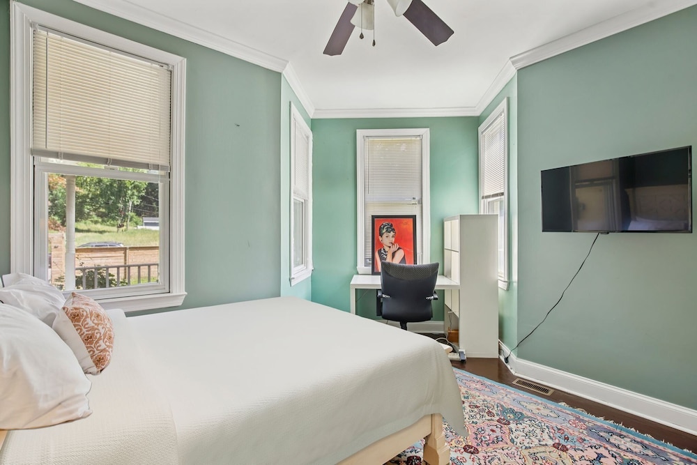 Charming Victorian Home With Porch & Large Yard 7 Bedroom Home