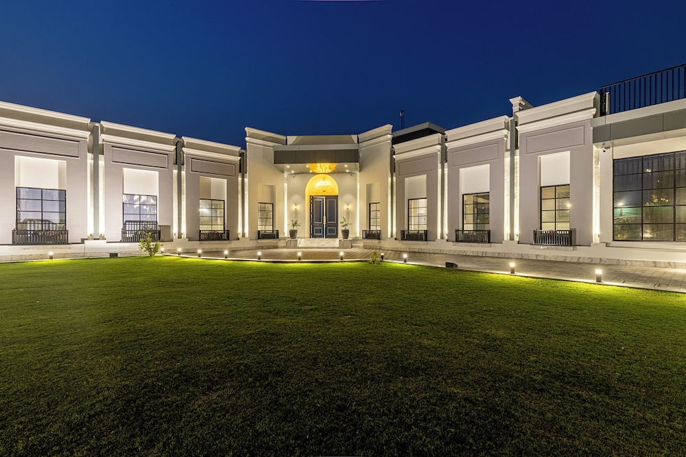 ELIVAAS Ibiza Luxe 4-BHK Farmhouse