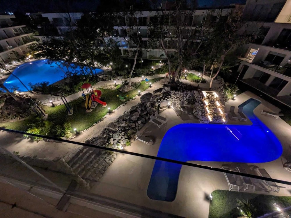 Stylish Playacar Condos w Balcony & Pool