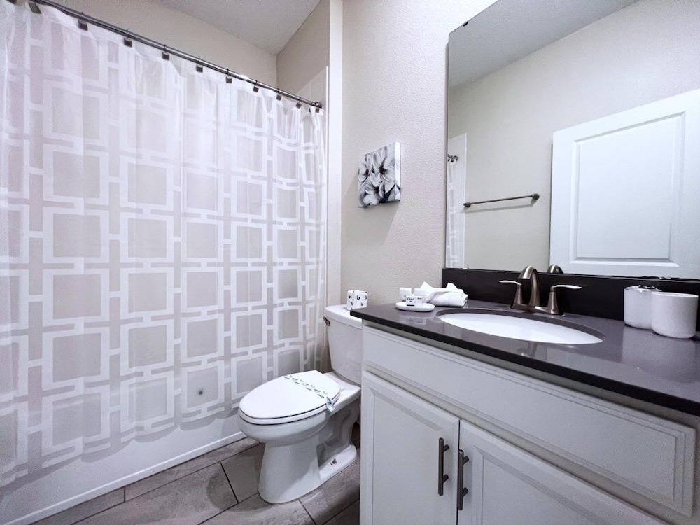5 Bed 5 Bath South Facing Pool Home Storey Lake 5 Bedroom Home by RedAwning view 2