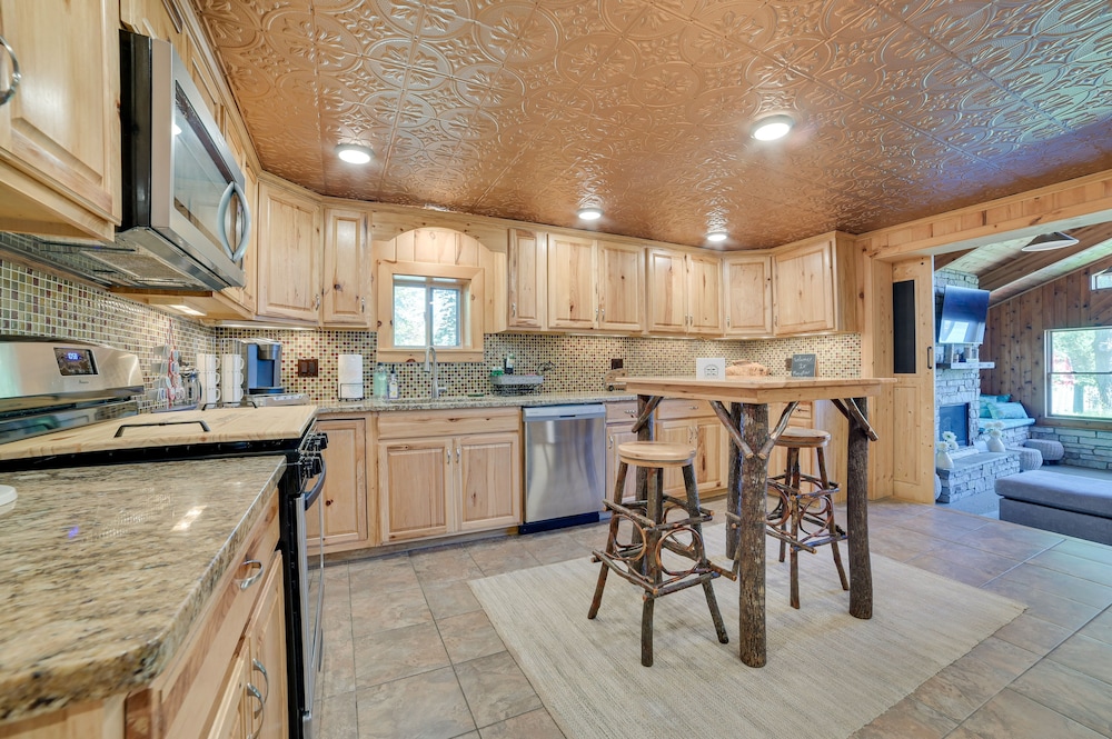 Lakefront Kalkaska Cottage w/ Fire Pit!