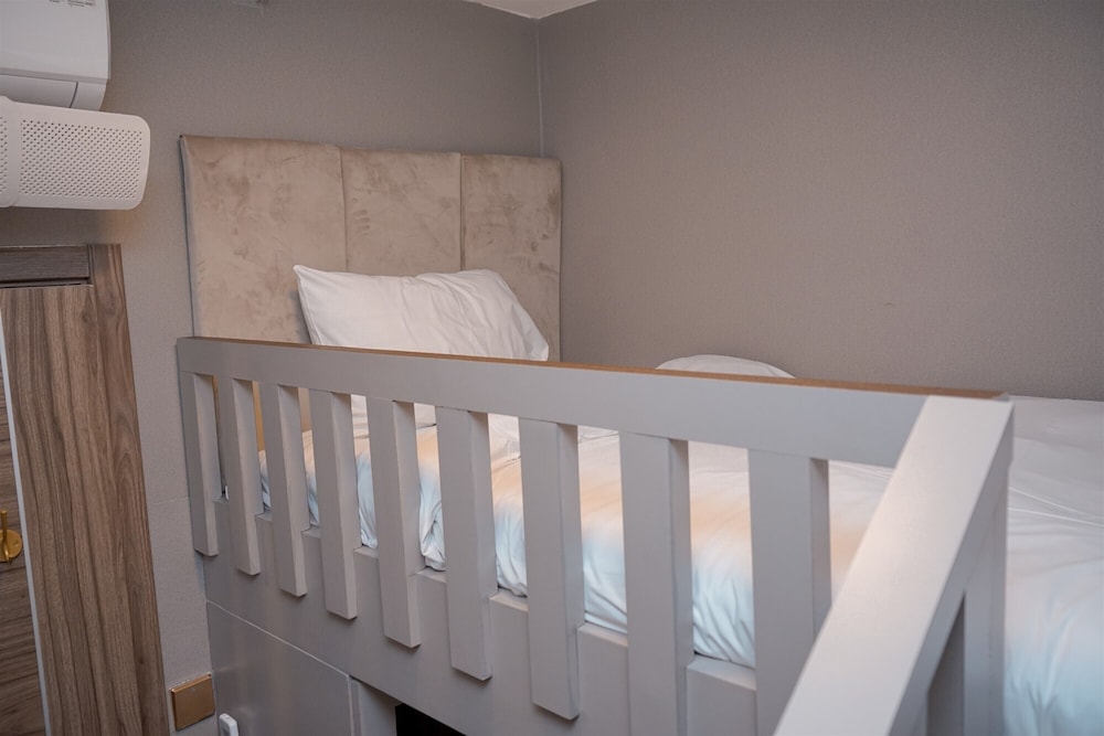 Warm Living 3BR at Sky House BSD Apartment
