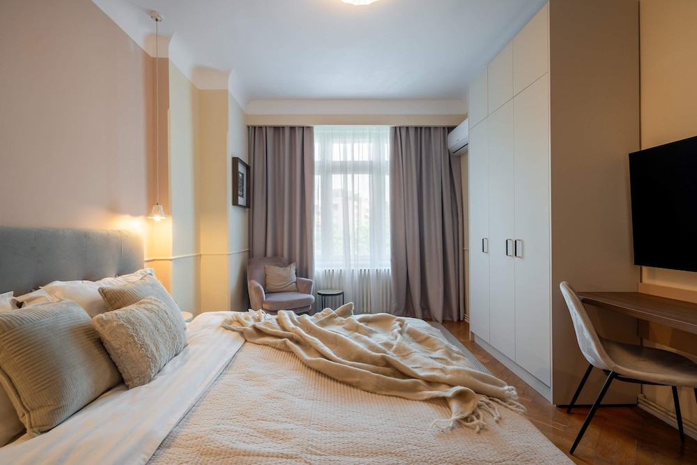 Elegant 3BR Flat Steps From Romanian Athenaeum