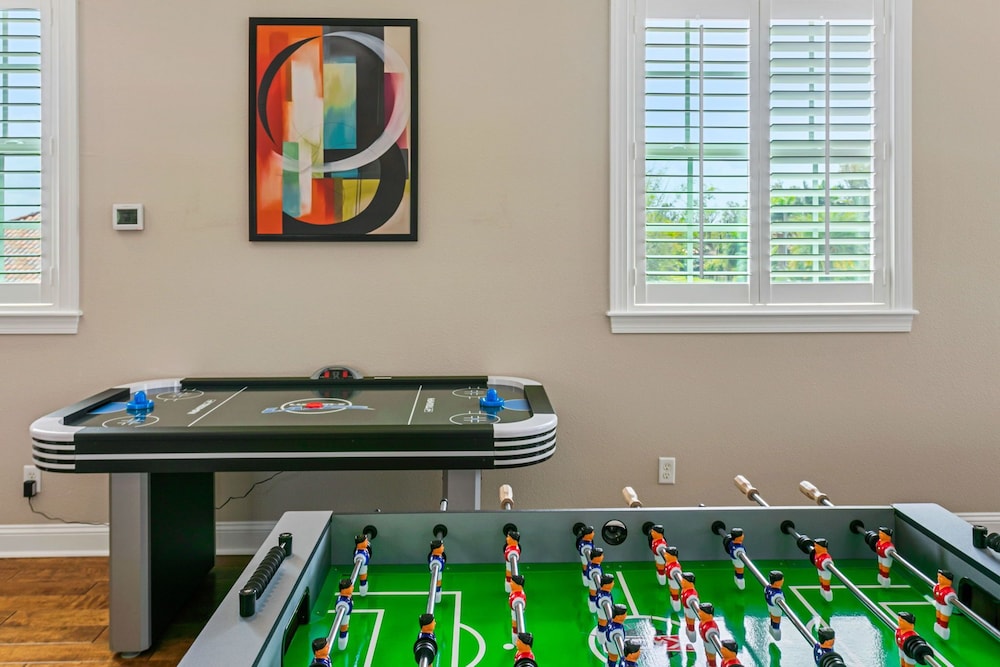 Waterfront Pool Pickleball Court Game Room