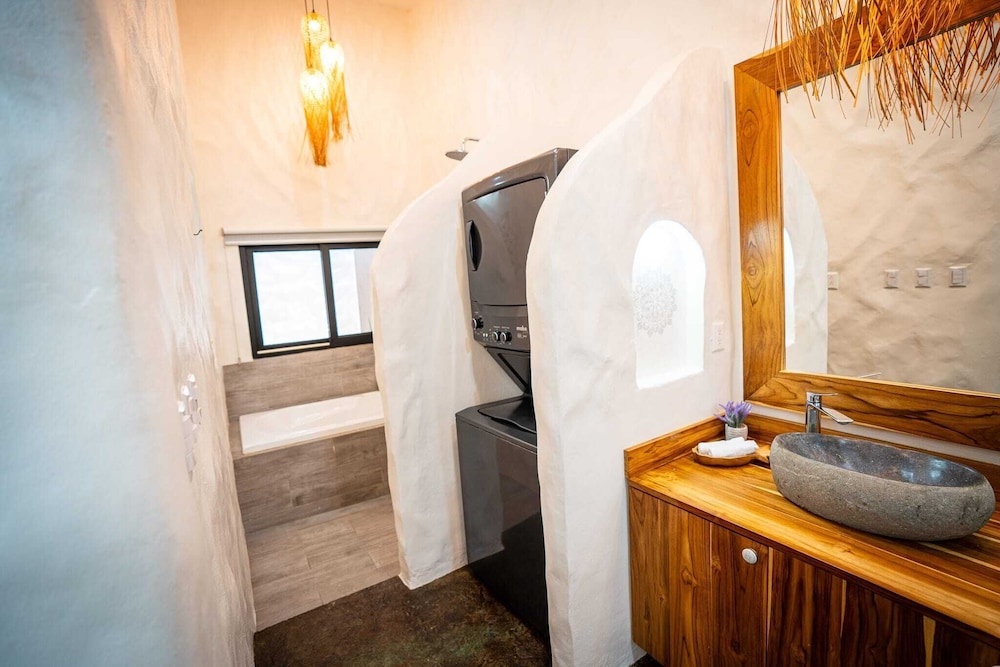 Bohemian Tropical Villa with a Tiki-Style Swimming Pool & Swim-Up Bar with an Attached Studio Apartment