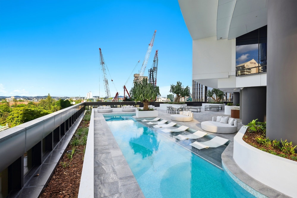 Modern City Escape With Pool Access and Views
